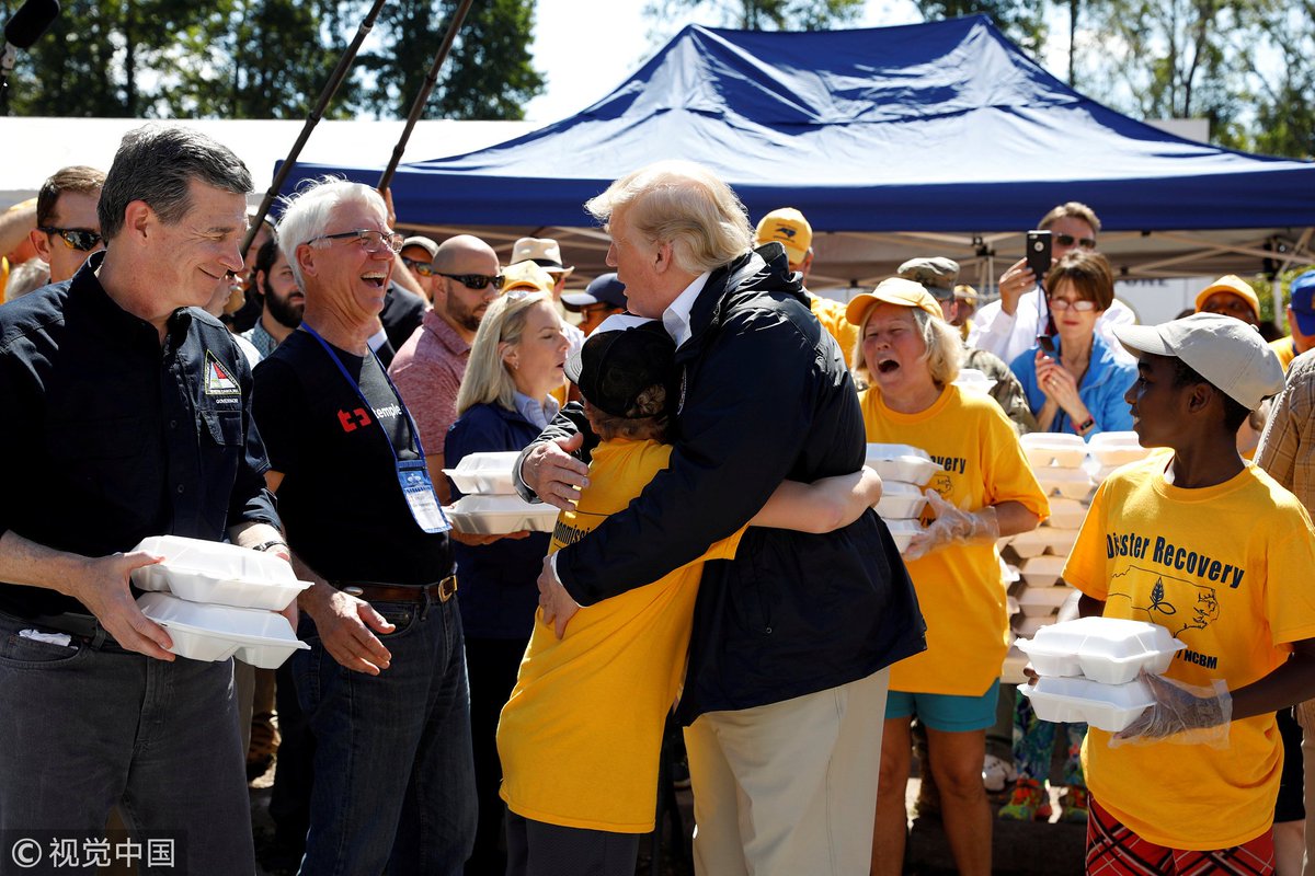 #US President #DonaldTrump visits residents in New Bern, #NorthCarolina as he tours areas of the eastern state pummeled by #HurricaneFlorence; #Florence death toll has climbed to 37, according to AP
