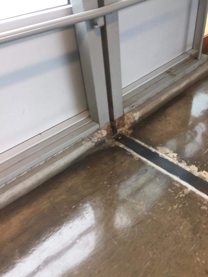 Nichol401's tweet photo. Rogers High school in Newport. This is where I have to send my daughter to school every day. She is exposed to rats, mold, asbestos, feces, leaking roofs, flooding classrooms, no running water and water that does is full of rust and lead, no heat. https://t.co/8mbLzs7SGY