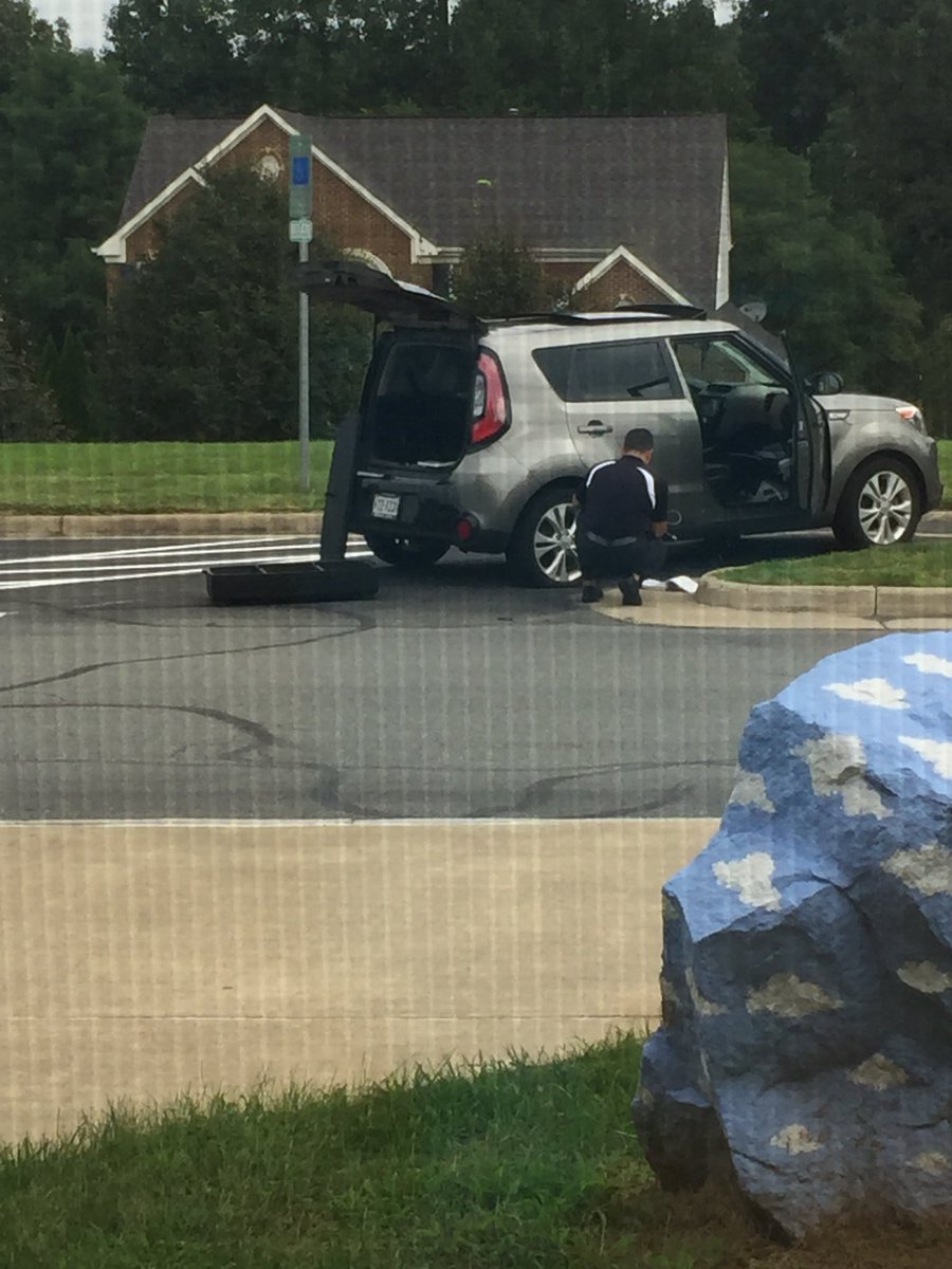 Our Principal helping others! Fixing a flat tire. Thank you Mr. Brazina!