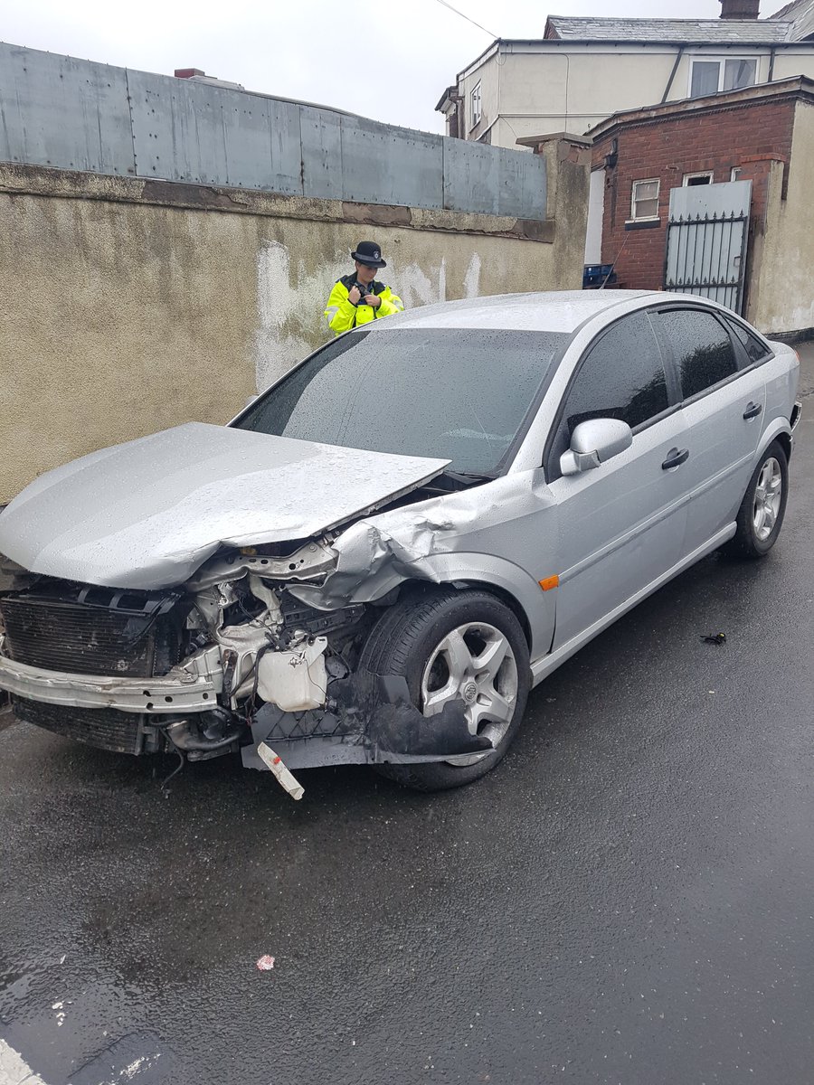 OldburyWMP's tweet photo. PCSO Howell and PCSO Spooner have recovered this stolen vehicle which has collided with parked cars, the vehicle was abandoned with blood stained airbags for forensics to examine. The offender will have a nasty headache from the impact. #Paracetamol #Carelessdriver https://t.co/ji7krBF6cr