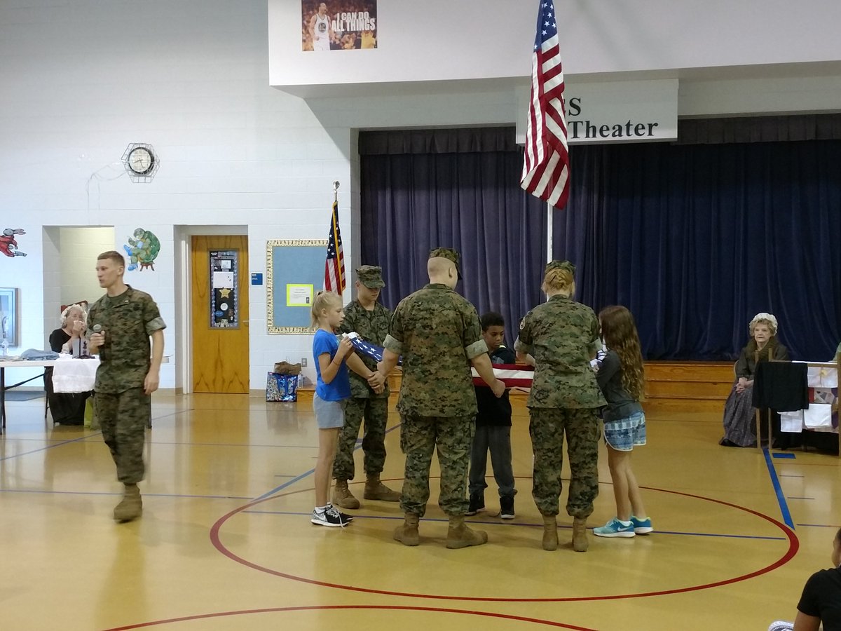 TCS_MCJROTC's tweet photo. TCS MCJROTC kicked off our Flag Etiquette series at BES today. Always great to work with the Ladies of the Revolution from our local DAR! https://t.co/0NT21dEEcY