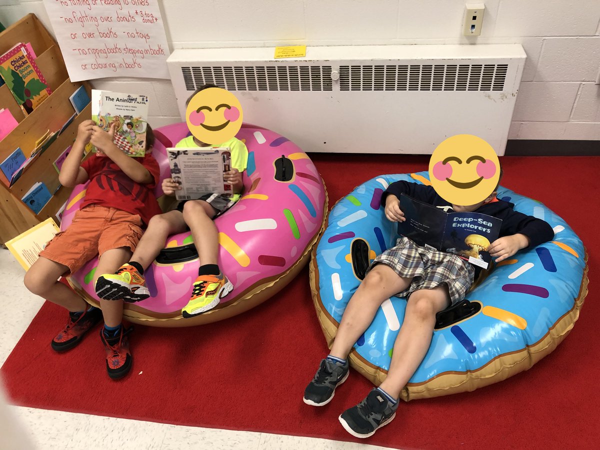 MissBond15's tweet photo. We love our Reading Donuts! They make great First Day photos and an excellent quiet and comfy spot to read! We know what Read to Self Sounds Like, Feels Like and What It Is Not and we just love snuggling up with a good book! #sccdsb #earlyliteracy #donutlove #lifeinkindy1 https://t.co/kyLVjupiab