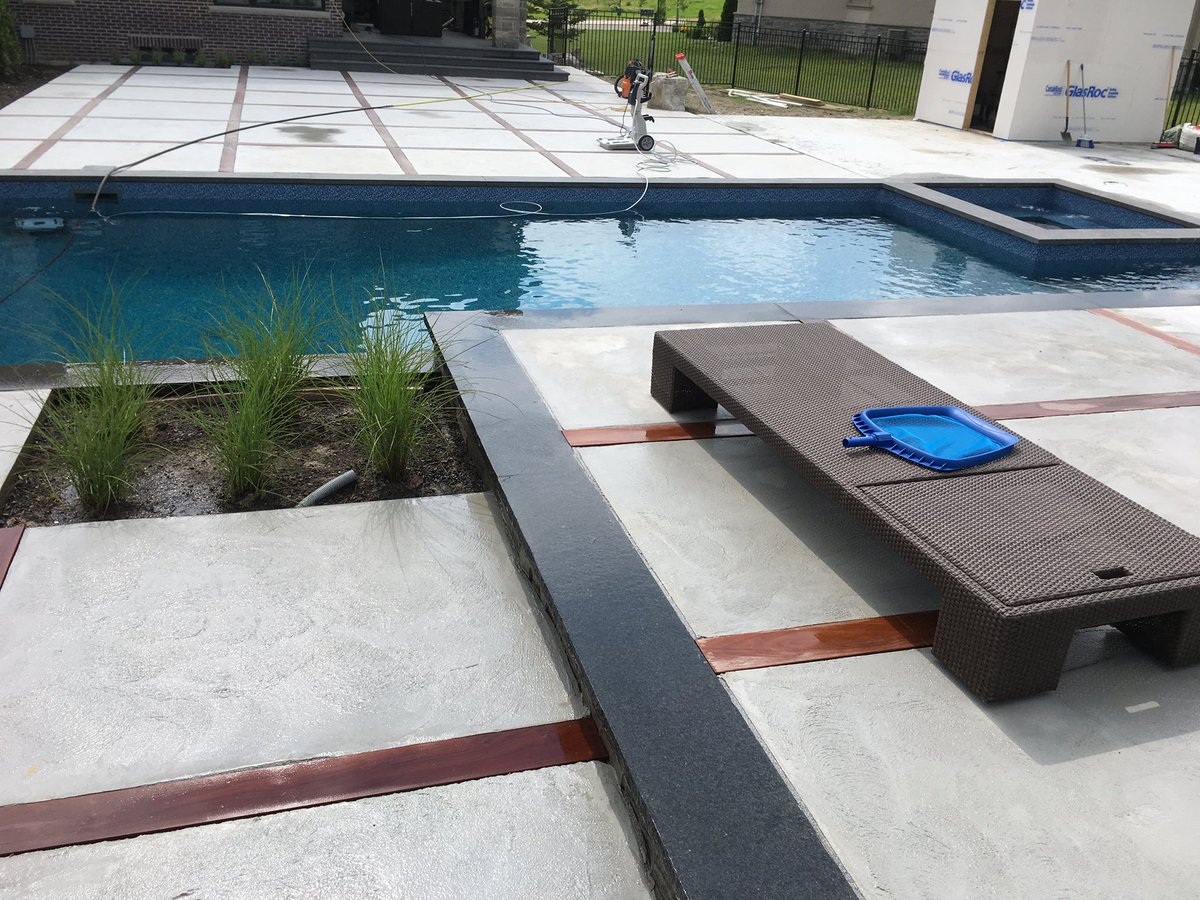 Can't wait to see this project complete! Pool size is 20' x 40 ' with custom hot tub that seats up to 12 people comfortably.  For a FREE quote, contact us at 416-896-0038 #pools #huttubs #cabanas #pergolas #armourstone #retainingwalls #interlock