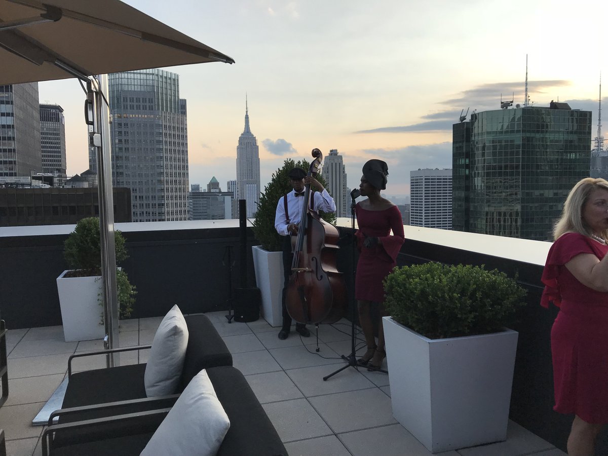 #BDCMeetings #meetingprofs  Made it Ma, top of the world, and there's a jazz combo playing! BDC  Meetings and Events entertained several dozen planner clients on the  Lotte NewYork Palace rooftop after a panel discussion on issues facing the meetings industry.