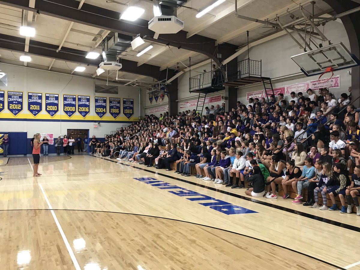 USD220's tweet photo. Former WNBA basketball player, Anna DeForge, speaks to students from Ashland, South Central, and Minneola at the 10th Annual WEPAC assembly. #WEPAC #Hope #CancerSucks @KAKEnews @KSNNews @MinnHScats @SPIAALeague @DodgeSportsGuy @KSHSAA https://t.co/2zE3oXJiPq