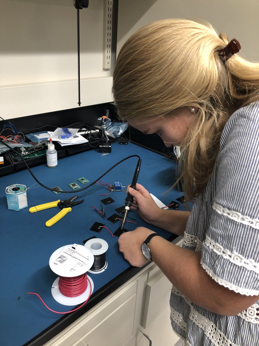 AlbertaSat's tweet photo. Our Educational Outreach Lead, Aimee Roy, is soldering some solar panels in preparation for a session with high school students tomorrow as part of @scilitweek. Get ready for some hands-on learning about solar energy and cubesats! #SciLit #liftoffalberta #edoutreach https://t.co/I0EYHlPJcl