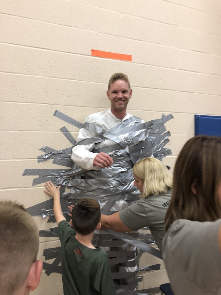 MrsWattssRoom's tweet photo. Ever duct taped your principal to a wall?  We have!  #ReadMoline #GoBicEagles https://t.co/wipyvFvyQj