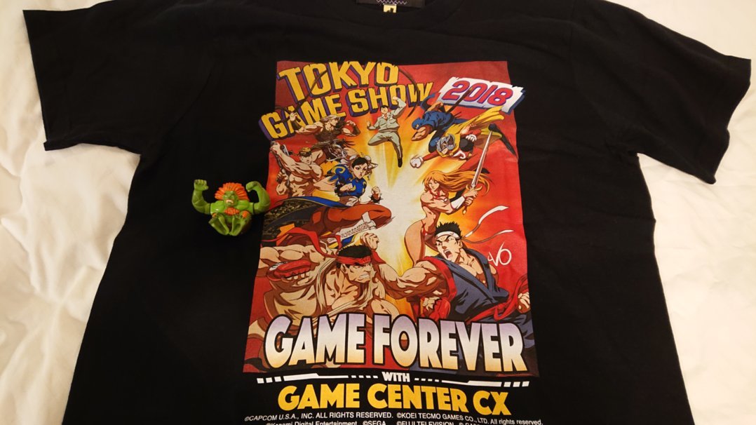 Yoshinori Ono 東京ゲームショウ2日目 ゲームセンターcx Gccx Official 番組ブースで Tgs18 コラボ有野課長 Arimorokoshi415 Tシャツ発見 Sfチームが監修したリュウ 春麗も採用されているっ これ着て明日の Cpt18 Jpn予選の準備を進めます
