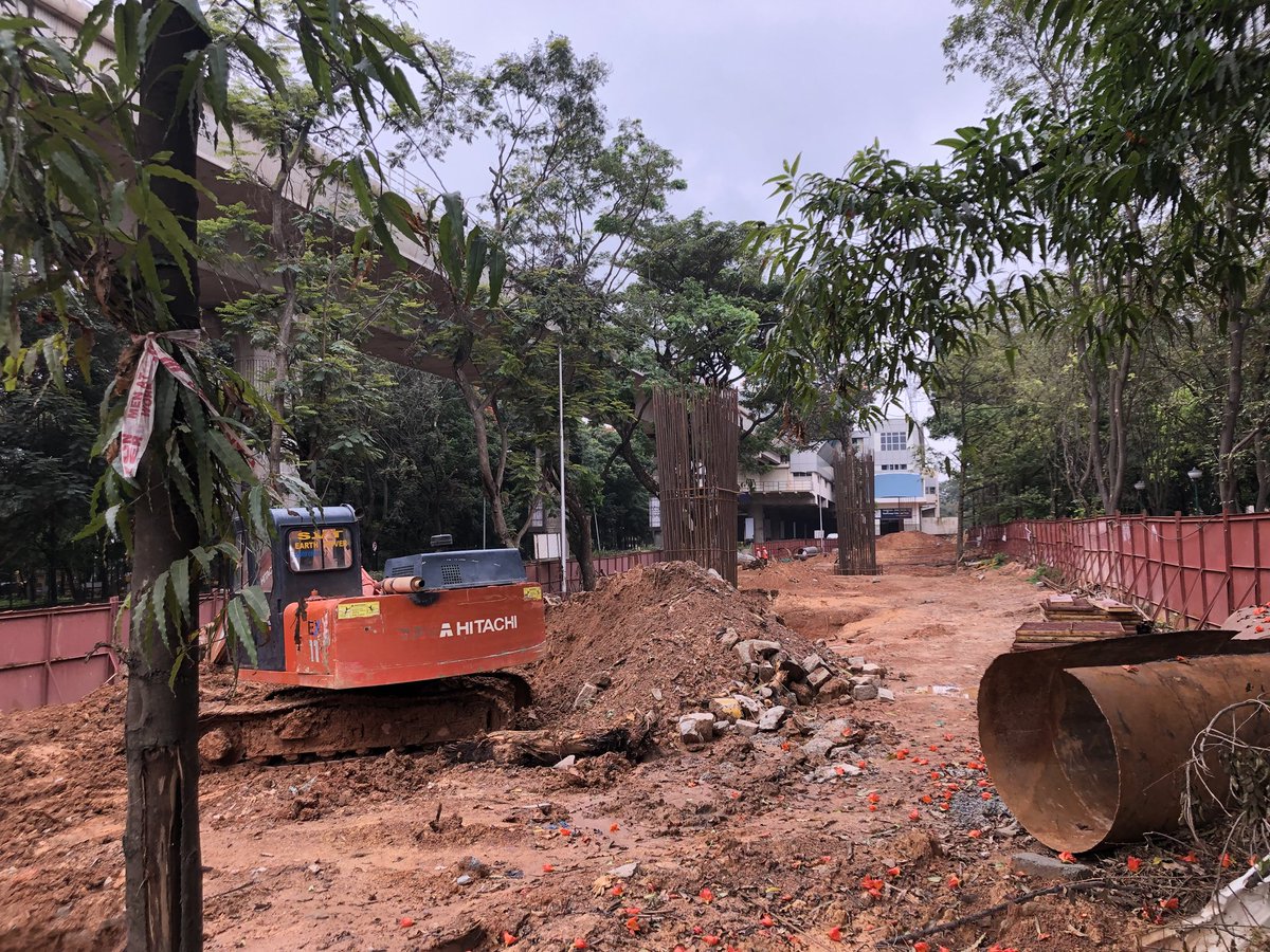 pramodchinder's tweet photo. @cpronammametro @BBMPCOMM was such a beautiful avenue on RV Road- isnt there any other way to avoid cutting so many trees and making dirty! Are you helping us to lead a better life by doing this? How did anyone give permission to cut such decades old trees @CMofKarnataka https://t.co/V3led33tVo