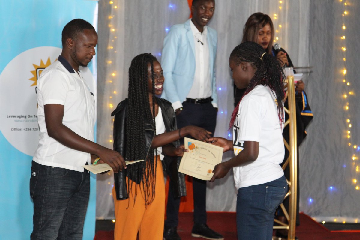 NairoBitsTrust's tweet photo. Certificate time! @junetwice from @moringaschool awards some of our students with their certificates. #wearebits #bitsgraduation https://t.co/QCkoOwjXKU