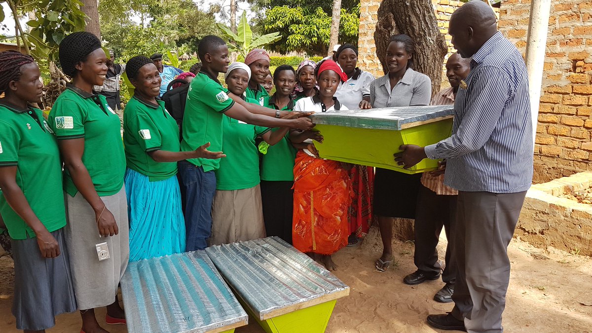 Mbaletrees's tweet photo. Helping women achieve more is among contributions we make to communities. 
The #Project_coordinator and @Mbaletrees team handing over 40 KTB hives to #Sunu_Women group. This will support production of >200 Litres of honey/yr. @sizeofwales @walesforafrica @TUNADO_Bees @BeesForDev https://t.co/hmOqtriSAm