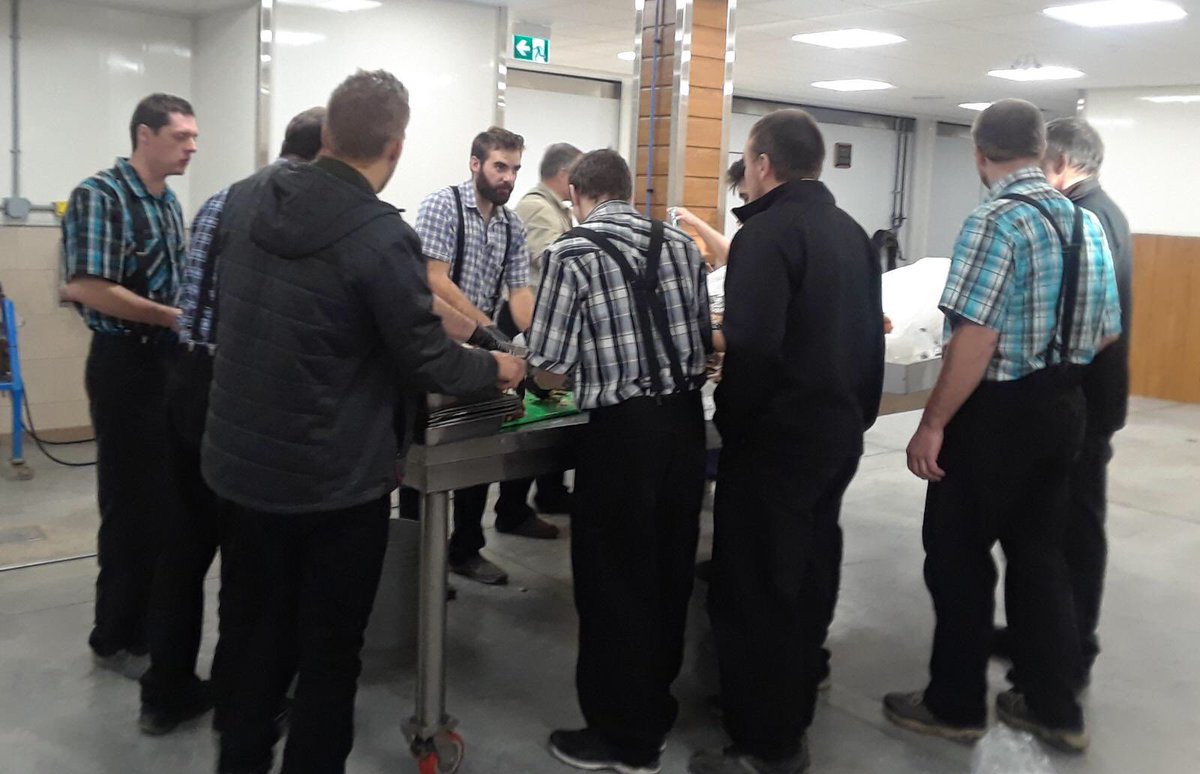 hutteritesorg's tweet image. To help celebrate Milltown Colony’s 100 year centennial, Norquay men are seen prepping and serving a smoked whole-hog for the occasion. The meat turned out perfectly, and the celebration a success. #hutterite #hutterites #hutterianbrethren #celebration #wholehog