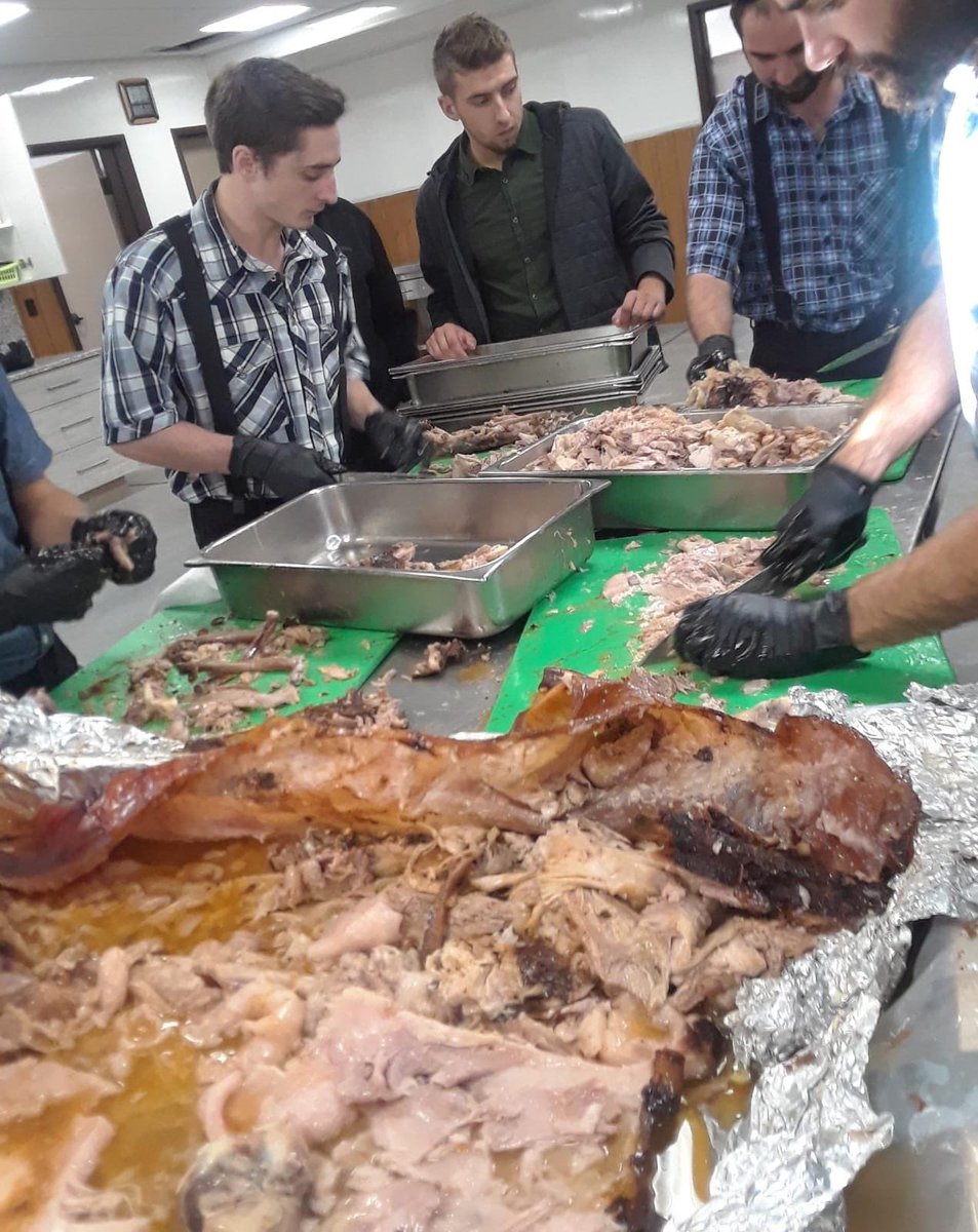 hutteritesorg's tweet image. To help celebrate Milltown Colony’s 100 year centennial, Norquay men are seen prepping and serving a smoked whole-hog for the occasion. The meat turned out perfectly, and the celebration a success. #hutterite #hutterites #hutterianbrethren #celebration #wholehog