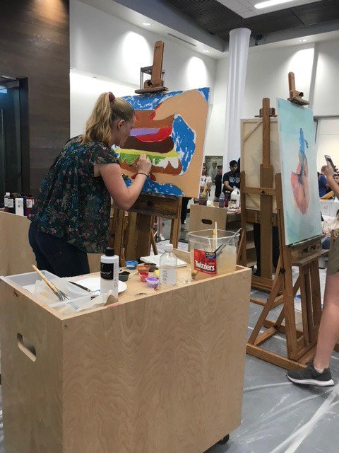 WCSKS's tweet photo. Today several WCS students are participating in a LIVE ART BATTLE!  The 2018 high school event will involve three different battles – one for painters, one for sculptors and one for culinary artists.  #MARKARTS #WCSFINEARTS https://t.co/ZuZzcEKRll