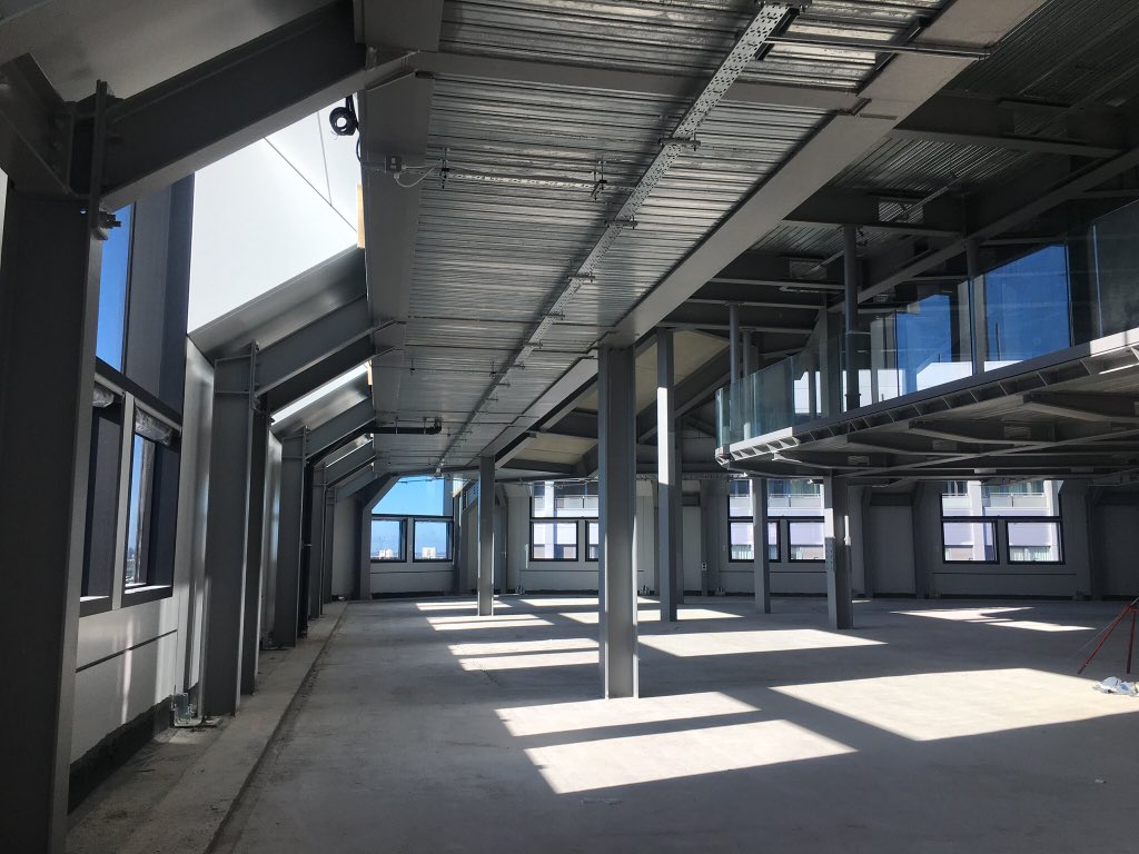 jesslove189's tweet photo. Thank you @BritProp and @OxfordPropGrp for this morning’s presentation and tour of #ThePostBuilding - a redevelopment of the old Royal Mail Sorting Office into a mixed-use building with unique office space #BPFFutures https://t.co/WI4CxlR1AA