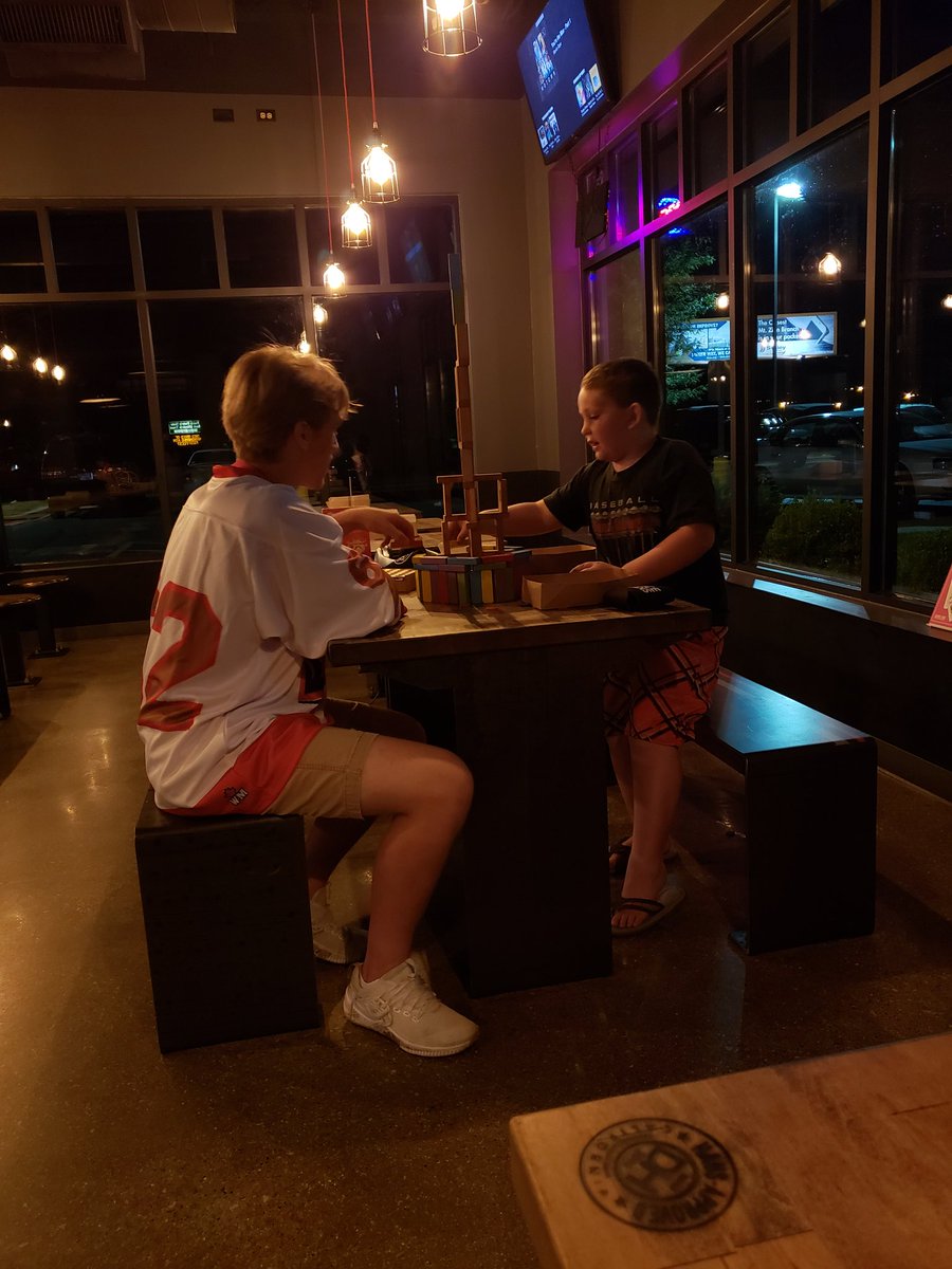 DecaturBlaze's tweet image. Couple of photos of some of the boys out @DogHausDogs volunteering and getting the word out about the upcoming season! First home game October 19th! Retweet if you think CJ was the one to knock down the Jenga tower.