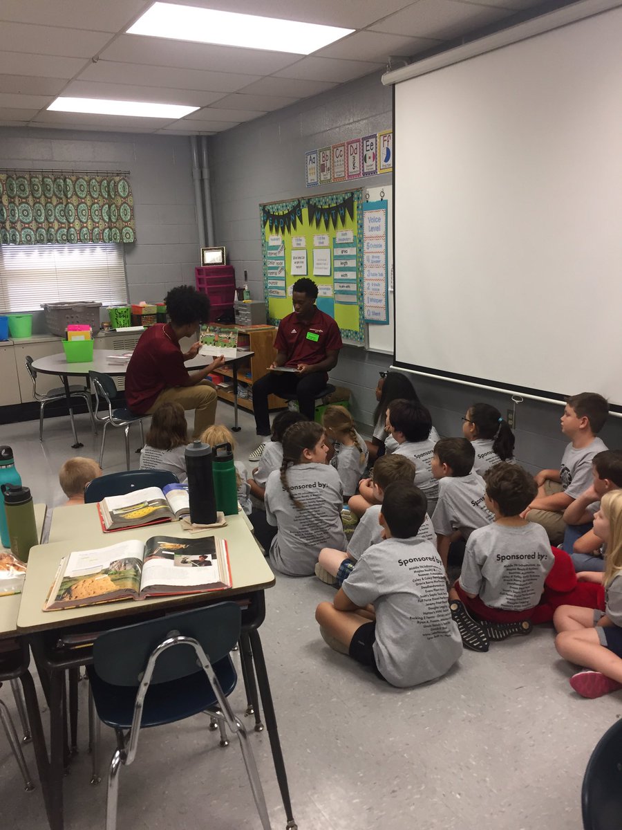 coachkriesky's tweet photo. The Warriors had a good time reading to the elementary students today. It is always neat to see our young men interact with these students. It was a great day for everyone. https://t.co/CjKM4tsLlM