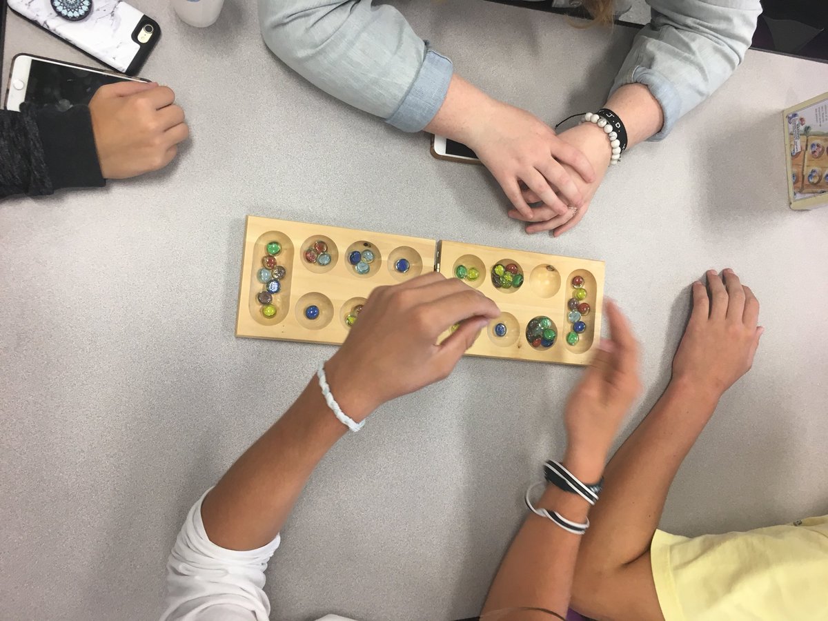 GCS_English's tweet photo. #LWfC Like Water for Chocolate end-of-unit Biazarre @StuartWCramerHS : complete with wedding cake, Christmas Rolls and Mancala! #ShiftheNorm @GCSHighSchools https://t.co/YWKQdSTFSd
