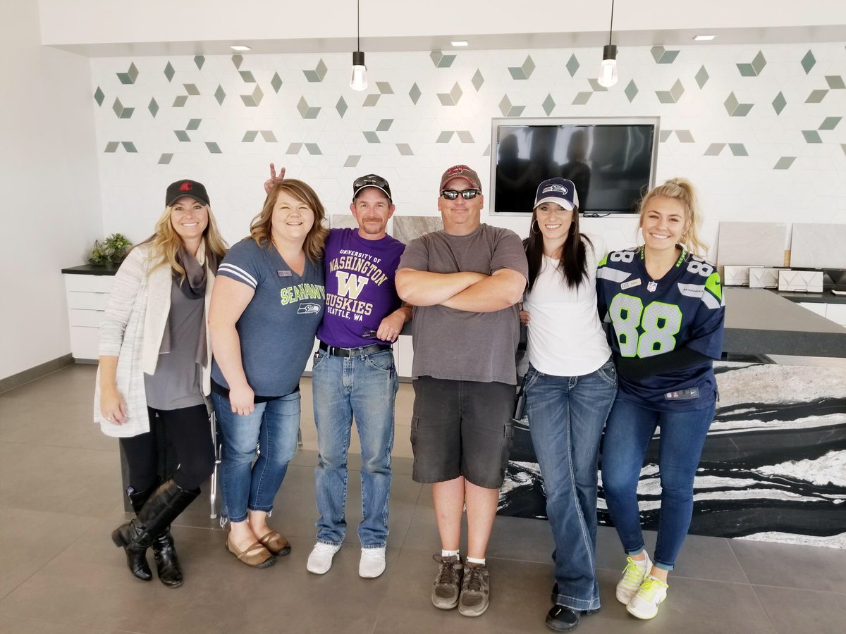 bedrospokane's tweet photo. Our team sporting their favorite football attire today! Go team go!  ❤️🖤🏈💛💜🏈💚💙 https://t.co/deHdgNihBY