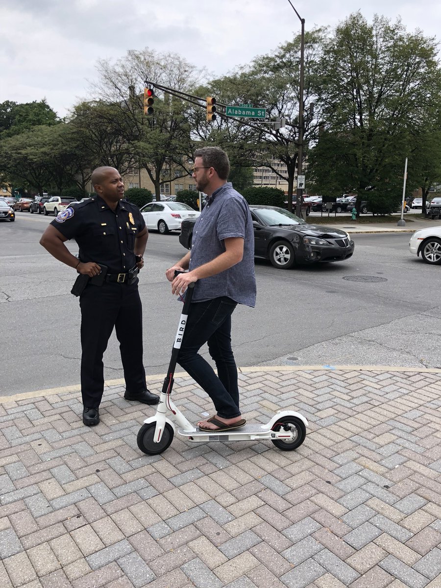 IMPDnews's tweet photo. Lt. Mike Wolley and @JimThePIO educating riders on Mass Ave about ๐ด rules while out putting together a #PSA for next week on the topic #KnowTheRules #ScooterRules https://t.co/IWbJJGbC5s