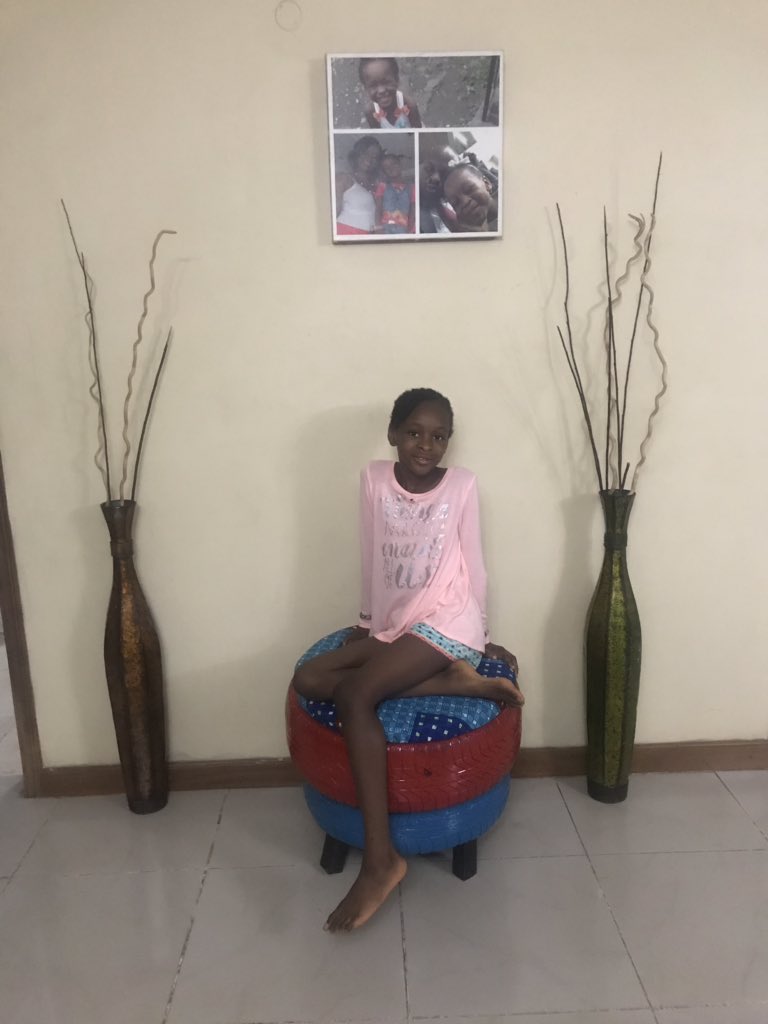 Gisele trying out the raffle prize I won at the #ChangingNarratives event. Seating stools made from recycled tyres by Shae Recycling #SaloneTwitter 🇸🇱