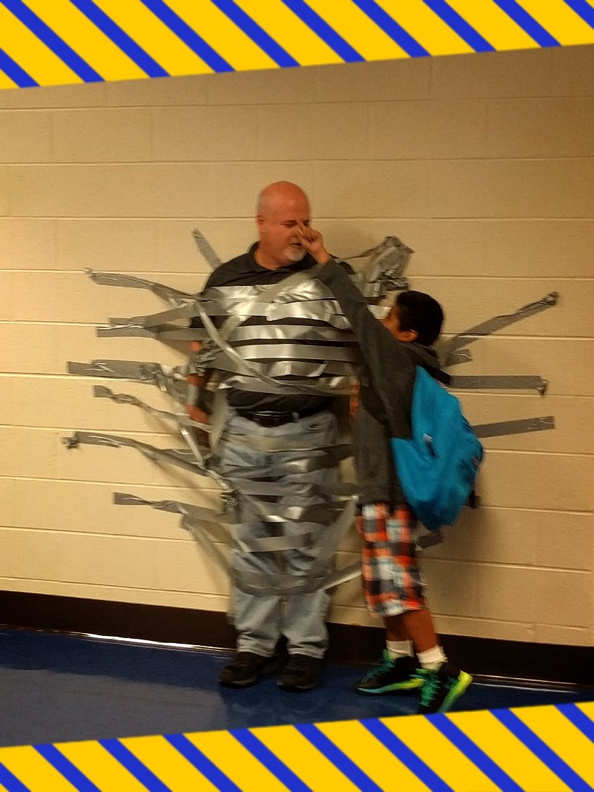 MsChristinaLi's tweet photo. One just has to lend a helping hand when the principal @mperk25 is ducked taped to the wall!!! π€£ @HendricksESPTA #HelloFallBreak https://t.co/PZePtU84wt