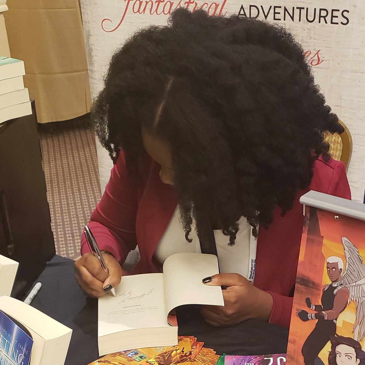 NadegeRichards's tweet image. Signing copies of all 6 of my books at my 12th book signing. ❤ #IAmMyOwnGoals