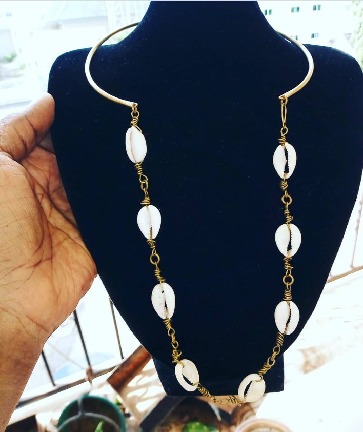 pdbraide's tweet photo. I've been making new stuff.  #brass #cowrie
Front closure choker necklace. Is it a choklace? 😂
The beauty of brass is if it darkens just polish. It's forever 
Bracelets and earrings also available https://t.co/dUbx7w0M5t
