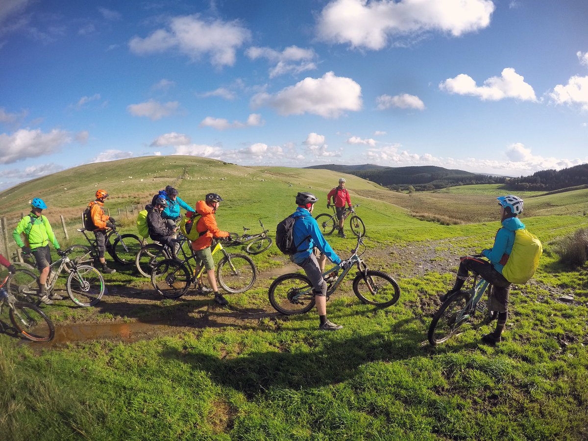 Polly directing the gang on day one of the #transcambrian under blue skies. 

However it was baltic thanks to #stormali #mtb #Wales #CambrianMountains 🏴󠁧󠁢󠁷󠁬󠁳󠁿⛰🌧💨🚲