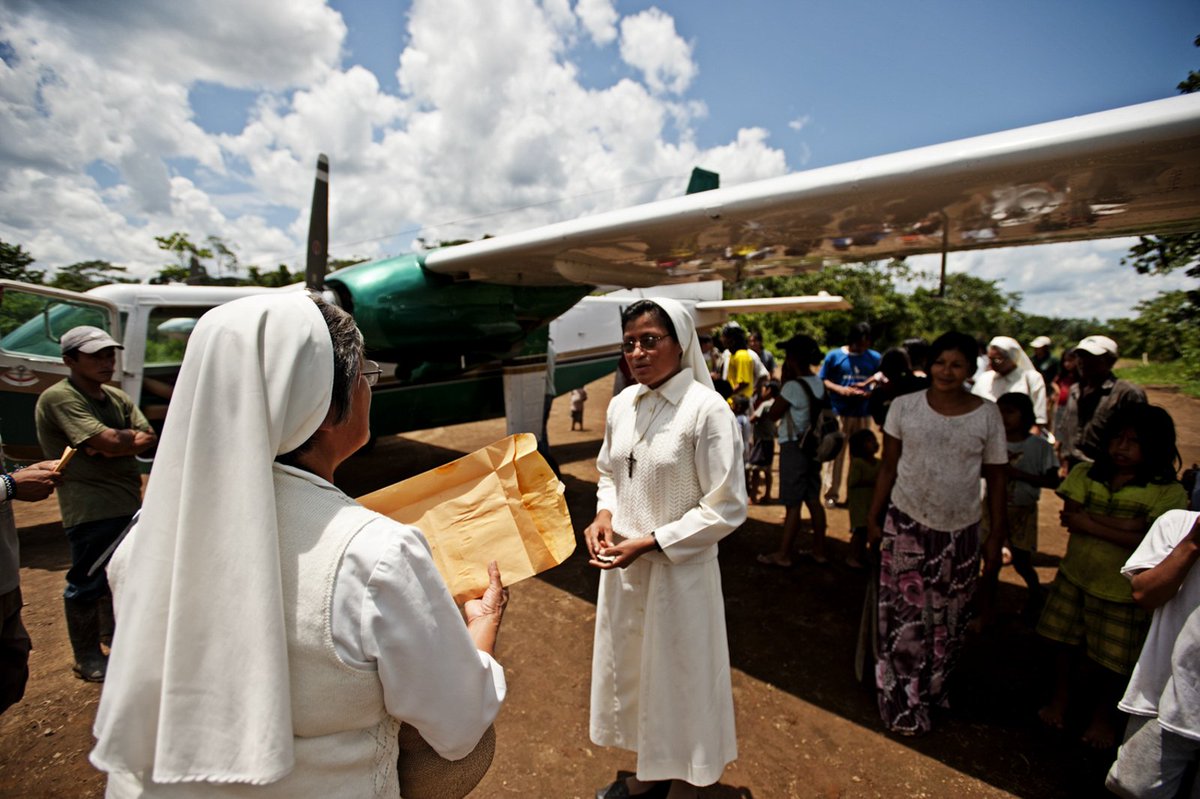 Missionaries visit a small Achuar community in the Amazon rainforest. The Achuar are a community of 12,200 individuals living in 45 distinct, smaller communities spread out over nearly 2 million acres of rainforest Ecuador. #Achuar #Amazon