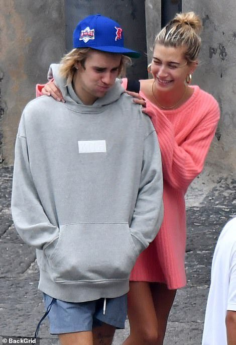 jdbftavon's tweet image. hailey trying to make justin smile bc he was feeling seasick is so cute 🤧