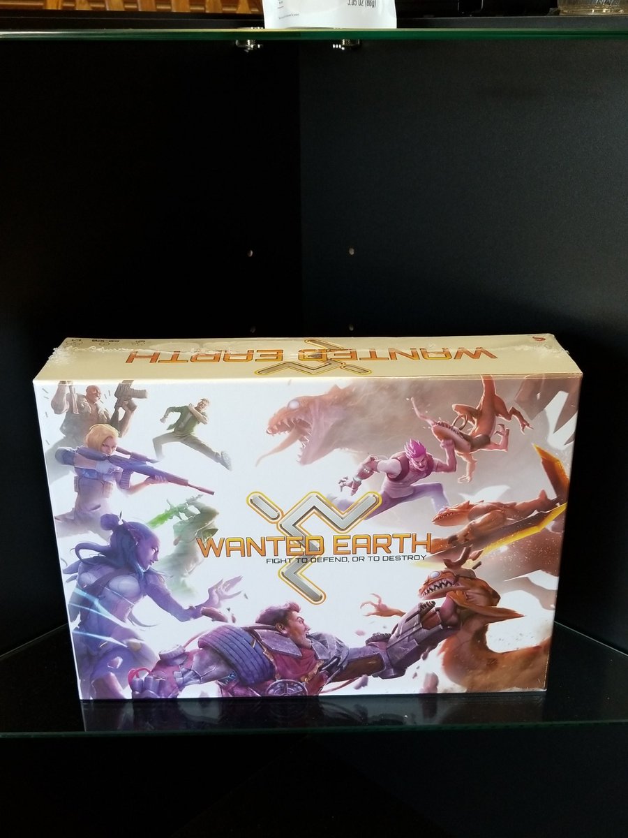 Stop in today to pick up your copy of #wantedearth 
We have a bundle! Core game, play mat, and comic book all together!
#boardgames #darkmattercoffee #miniatures
