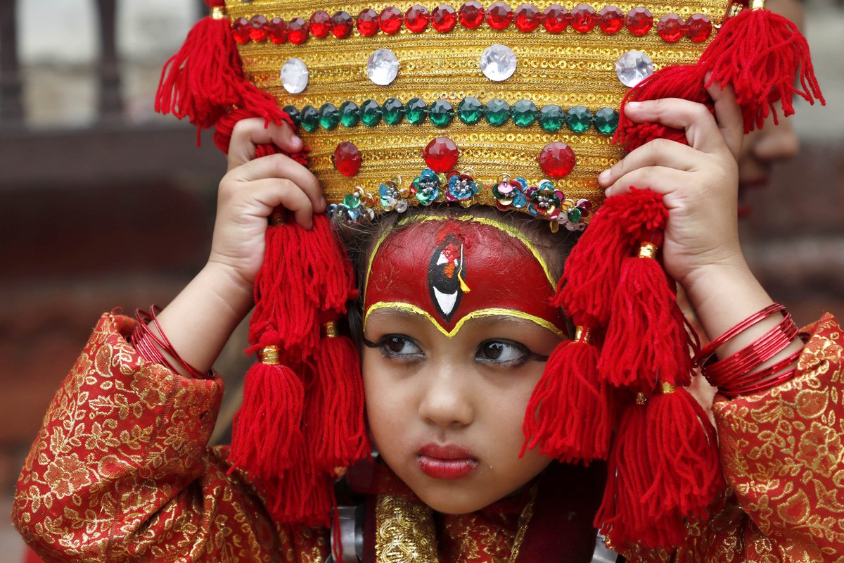 The Kathmandu Post on Twitter: "Young girls attired as living Goddess Kumari during mass Kumari Puja at Hanuman Dhoka in Kathmandu on Saturday. A total of 108 girls under the age of