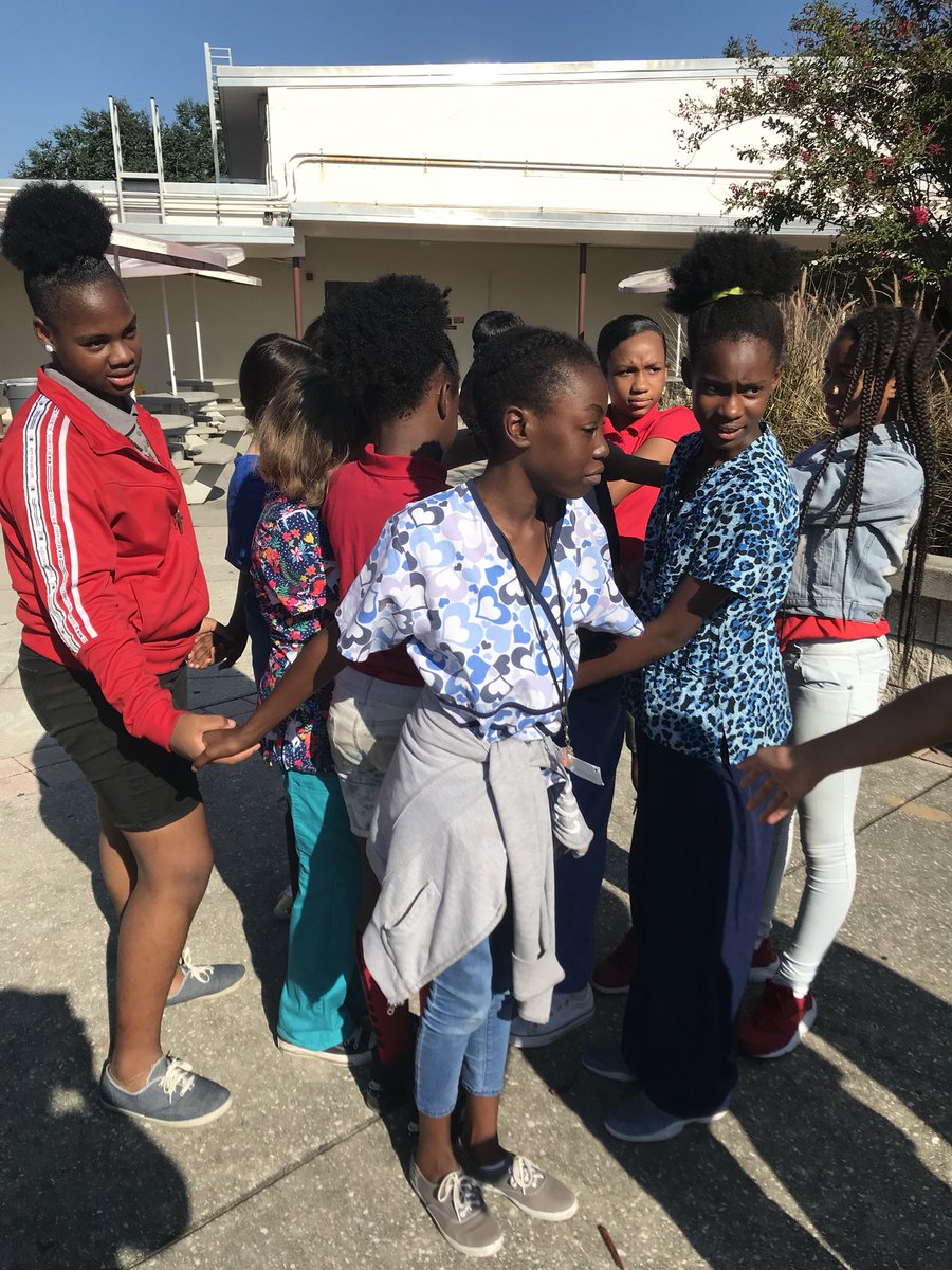 AvidSligh's tweet photo. Teamwork makes the dream work. 6th graders getting a feel for what AVID is all about. Human knot. Girls working together to get themselves out of a knot. Way to go girls! https://t.co/LkrBxcQf19