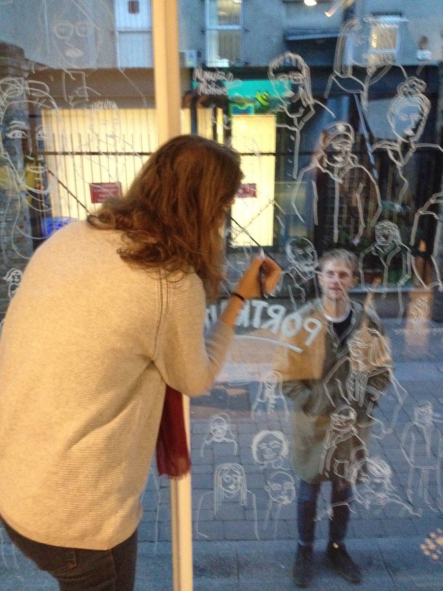 OliviaGolden58's tweet photo. Portraits being drawn on the window of the passers by and by the passers by. Interactive art in motion. It worked so well! Well done @FumballyExch #culturenight2018 #CultureisCatching https://t.co/HuM32vOZgM