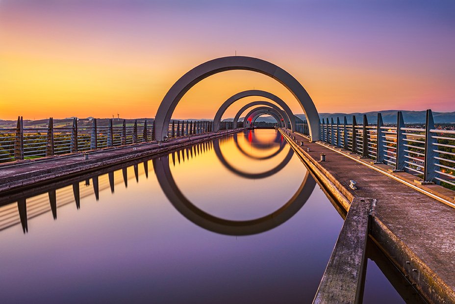 We love awe-inspiring wheels! The Falkirk Wheel Boat Lift in Scotland reconnects two important canals for the first time in decades.