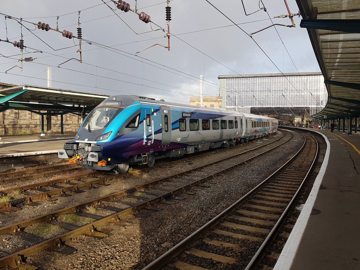 andy1901's tweet photo. @TPExpressTrains rainbow over one of your new trains https://t.co/Yp06QDiRpq