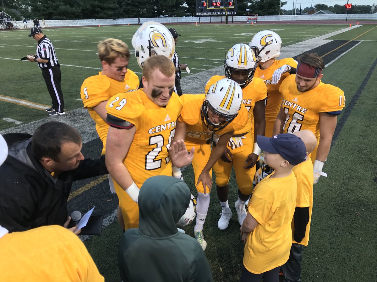MOvering's tweet photo. It’s Gold Out night and Centre is honoring some special kids tonight. Captains meeting the honorary captains before the game. https://t.co/3PBLkqvA6B