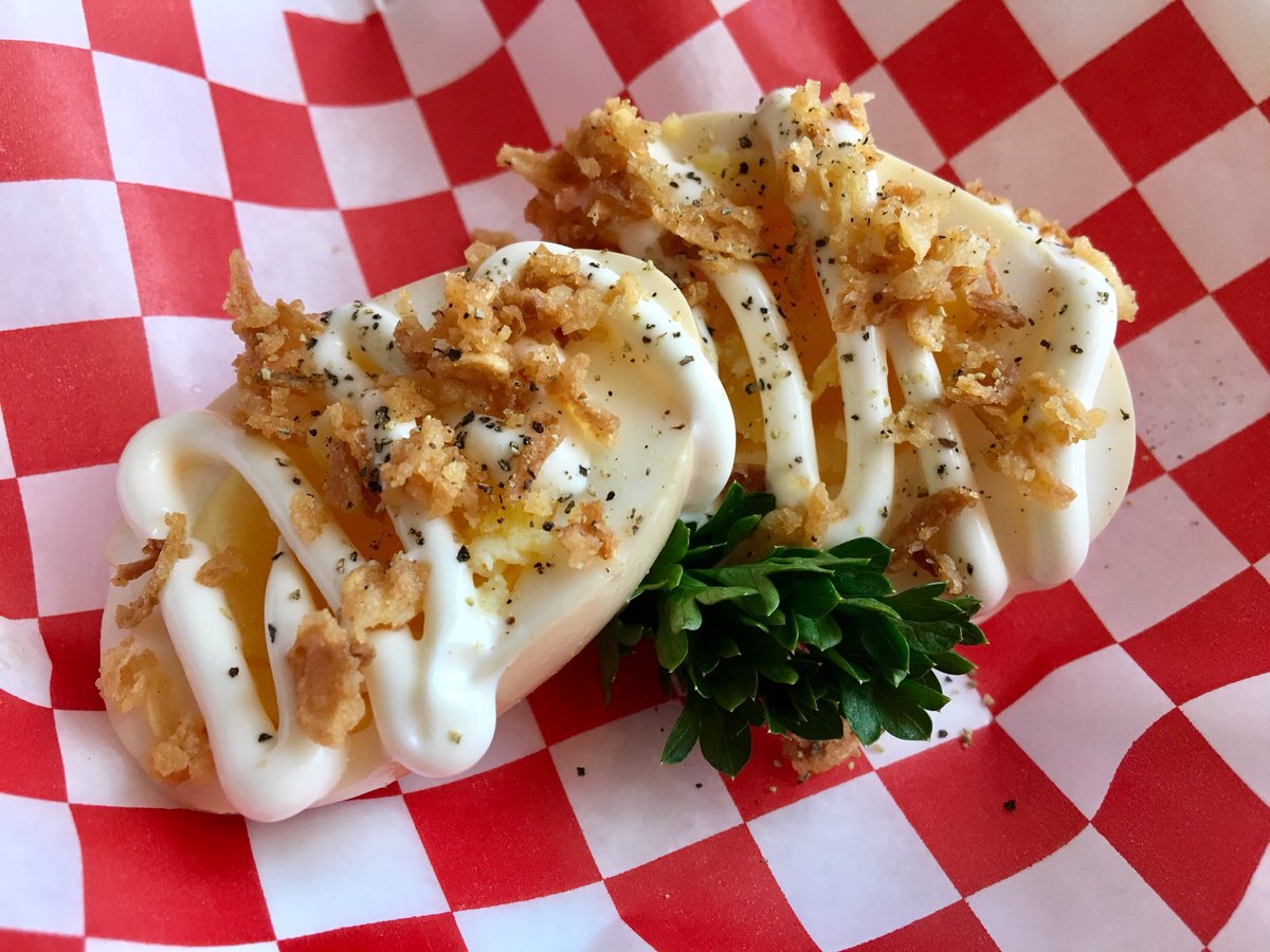 Pickled eggs are ready. Made in a beer brine and garnished with mayo and crispy onions. Just $1.75 for this thoughtful snack.