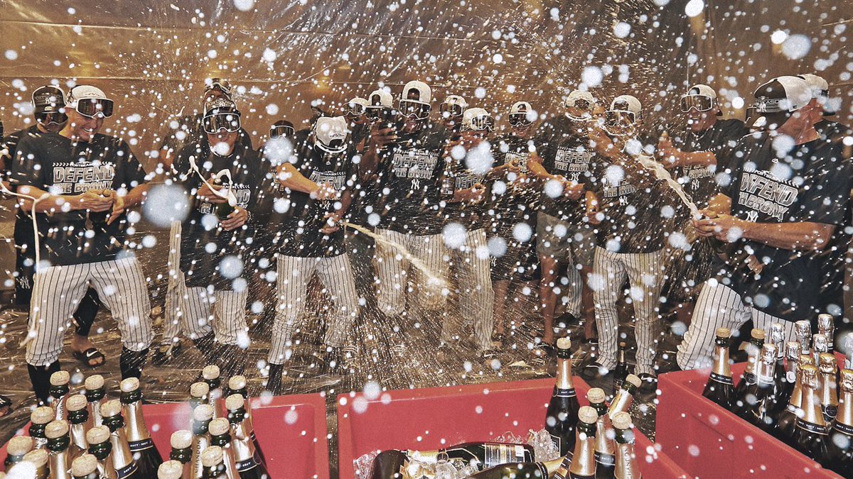 Yankees's tweet image. Clinched and drenched.