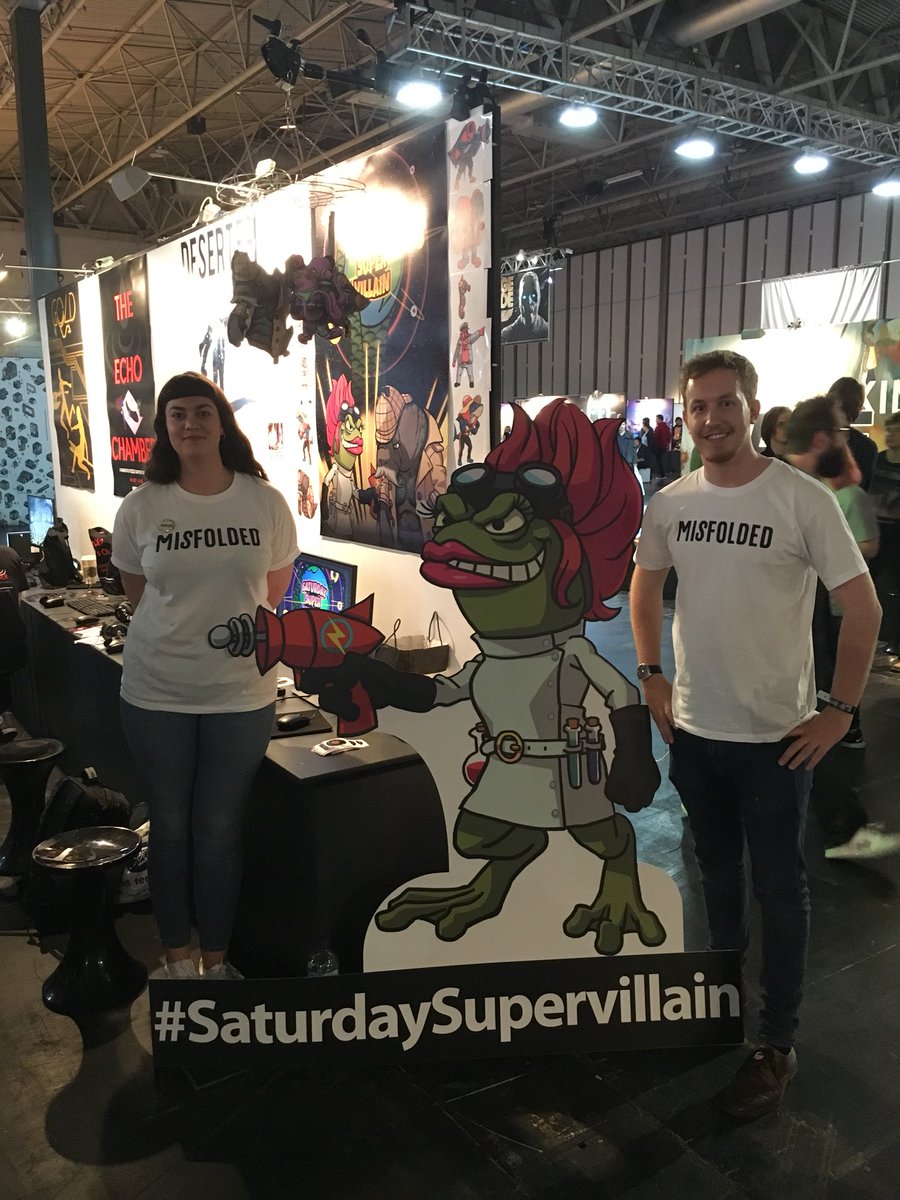 SVillainGame's tweet photo. Last day at #EGX18 Can’t believe the days flew by so fast! Stop by my stall today, take a quick #selfie with Amphibia, The #SaturdaySupervillain and win the best deck of cards there is. Everybody wins; just ask the @MisfoldedGame crew! https://t.co/L5BjrDiMgu