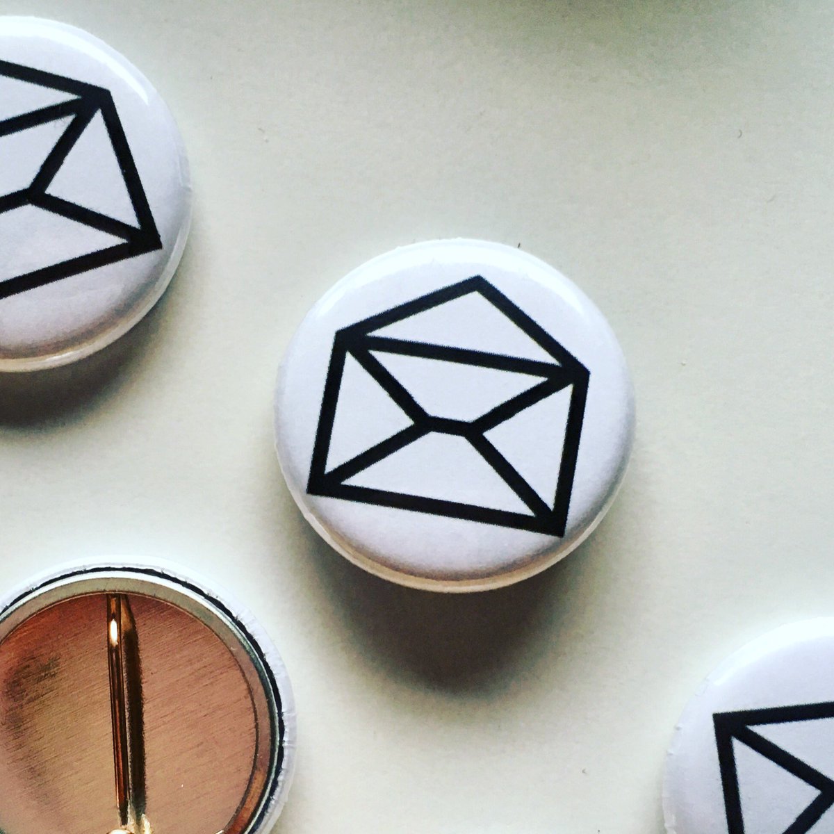 honestly stabbed myself in the thumb so many times with these badges, pls buy a zine &amp; i'll send you some badges too, get them away from me, save my thumbs, please. >>> opnletters.net/store