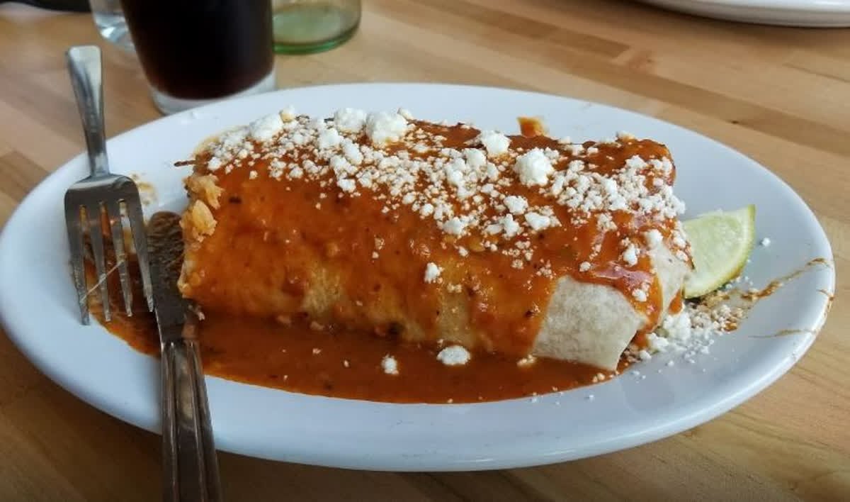 Enchiladas are a must have! Enjoy Rosa's enchiladas, two 9" corn tortillas filled with Monterey and cream cheese topped with New Mexico red enchilada sauce, drizzled with a housemade Mexican crema and served with rice and beans.
google📸: Jim V.