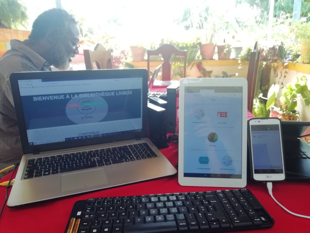 Potentiel3_0's tweet photo. Installation mediatheque numérique Livbox preparation contenu pour #haiti @unoga Lire permet de vivre 1000 vies #Livbox https://t.co/1dOh4eYzyo