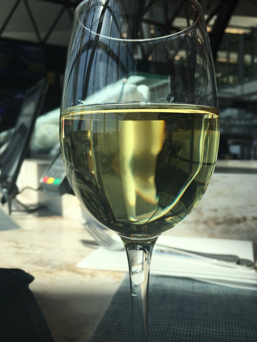 Arieschura's tweet photo. Layover #NapInterrupted Iβve moved on to Sauvignon Blanc and people watching - this local has predominate grapefruit and honeysuckle notes #TravelingShoes #ParisForOne #LongLayover https://t.co/pkX0ZgSilm
