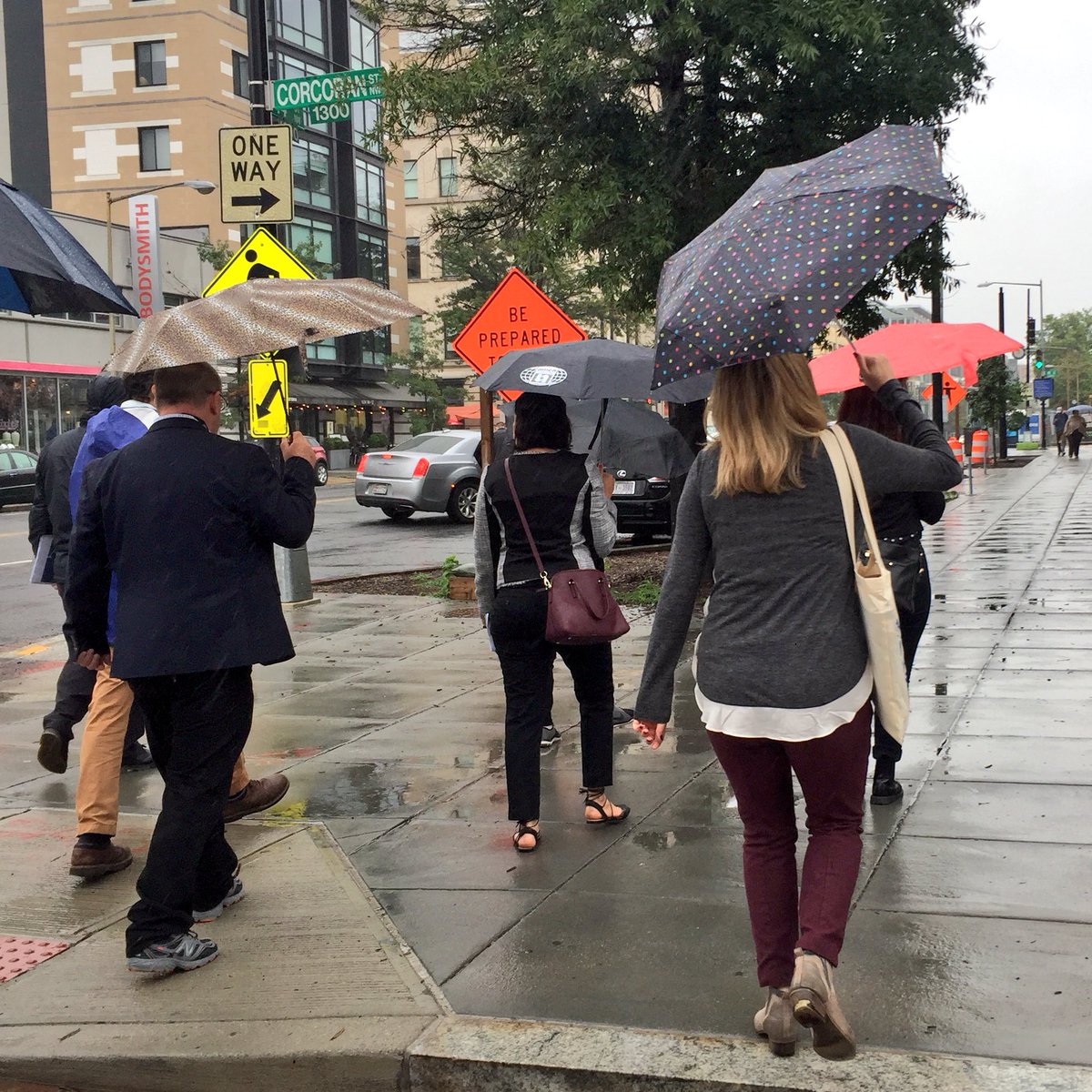 lindsayrnieman's tweet photo. Braving the rain for a great #APAPAC2018 mobile workshop with @DCDHCD and @OPinDC. Inclusionary zoning‘s brought more than 300 affordable units to market rate developments along the 14th Street NW corridor, one of the most expensive areas in D.C. #PlanningHome https://t.co/krkv6tJCO4