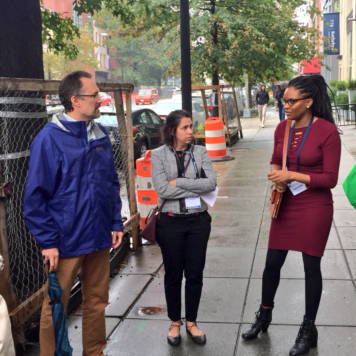 lindsayrnieman's tweet photo. Braving the rain for a great #APAPAC2018 mobile workshop with @DCDHCD and @OPinDC. Inclusionary zoning‘s brought more than 300 affordable units to market rate developments along the 14th Street NW corridor, one of the most expensive areas in D.C. #PlanningHome https://t.co/krkv6tJCO4