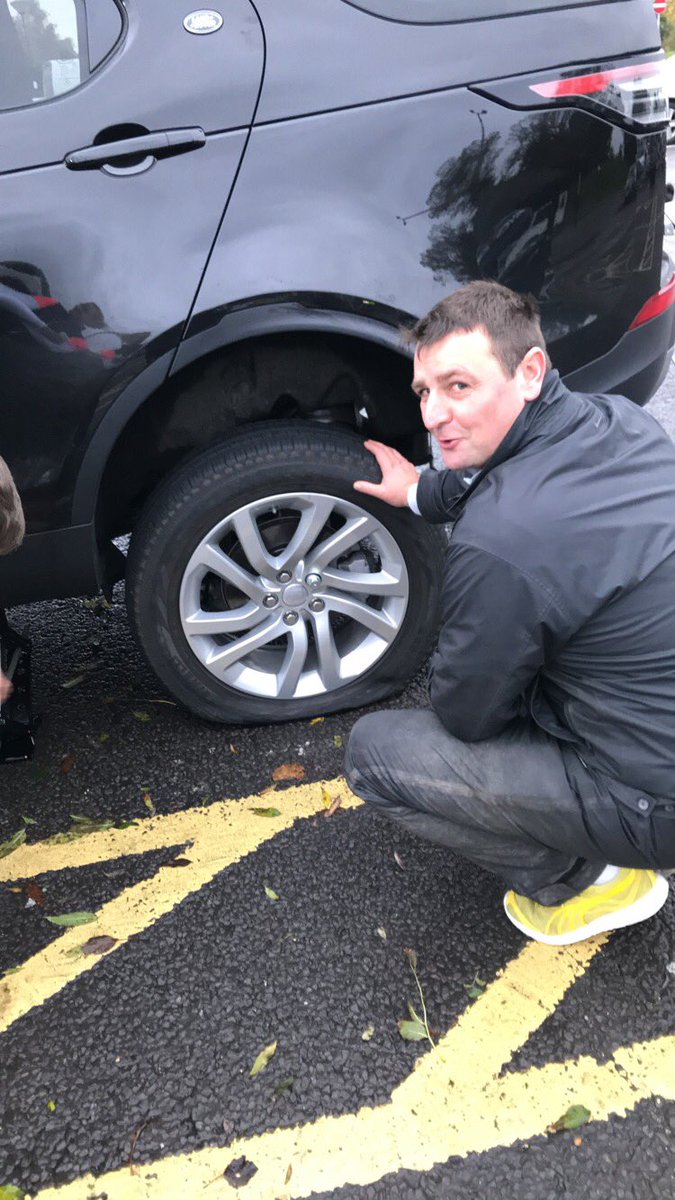 Marg_Shep's tweet photo. Good job we brought 2 very able bodied young men with us on our trip to @TrumpTurnberry #punctureproblems @Grassmonitor https://t.co/vwdDr7dayp