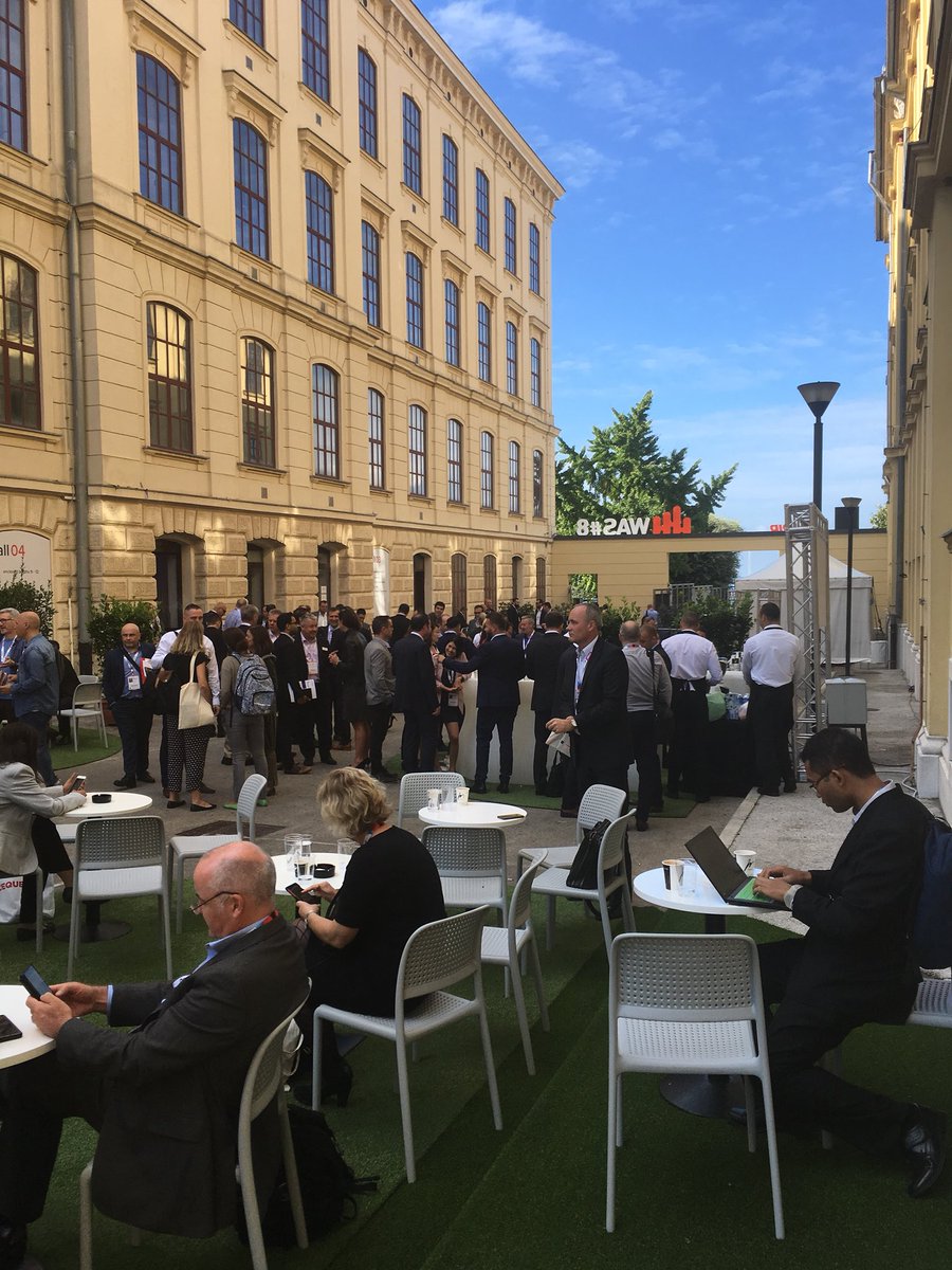 Infobip's tweet photo. The weather’s lovely in Rovinj, so #WAS8 delegates are enjoying networking in the open https://t.co/TRSq130q0S