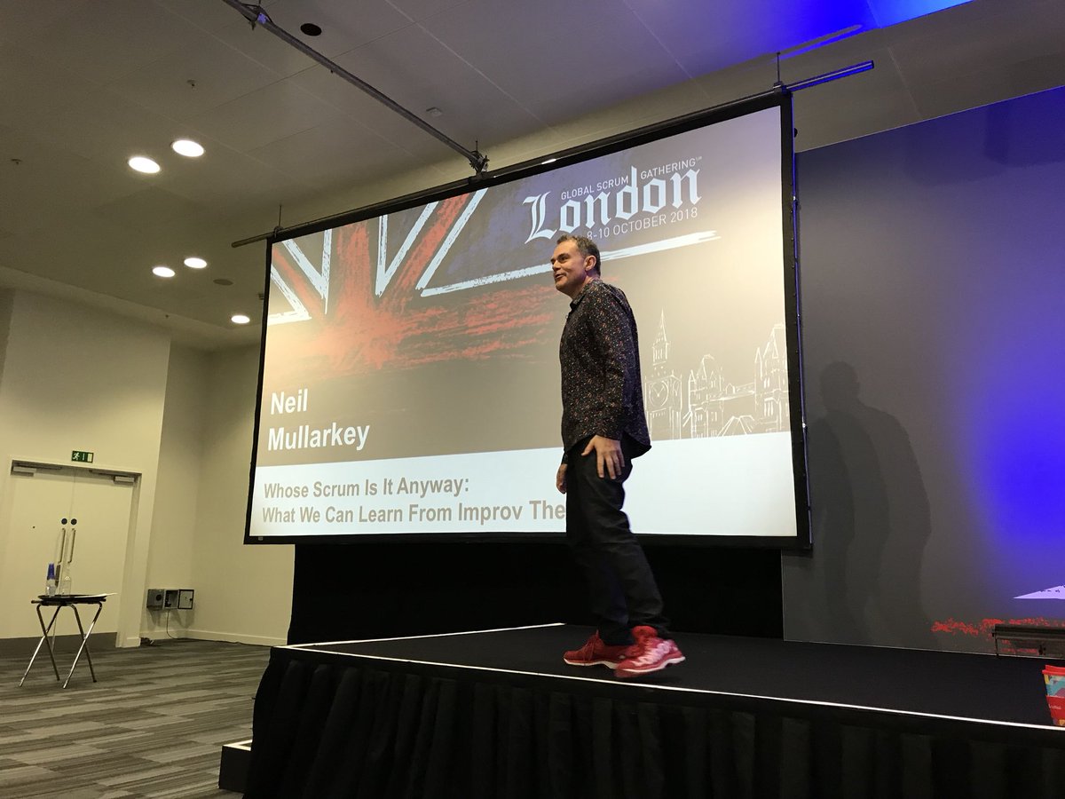 And the first keynote in the Scrummaster track has started with Neil Mullarkey! We are ready for some good laughs and great inspiration. #sglon